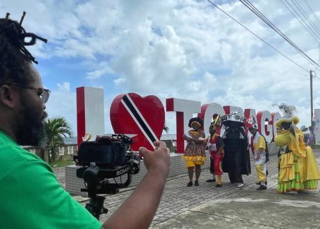 Caribbean carnival performers encourage communities to continue fight against COVID-19